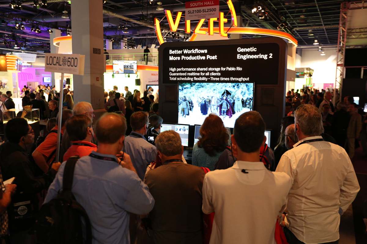 ICG Workflow Tour attendees, led by Stephen Lighthill, ASC, visit the Quantel booth