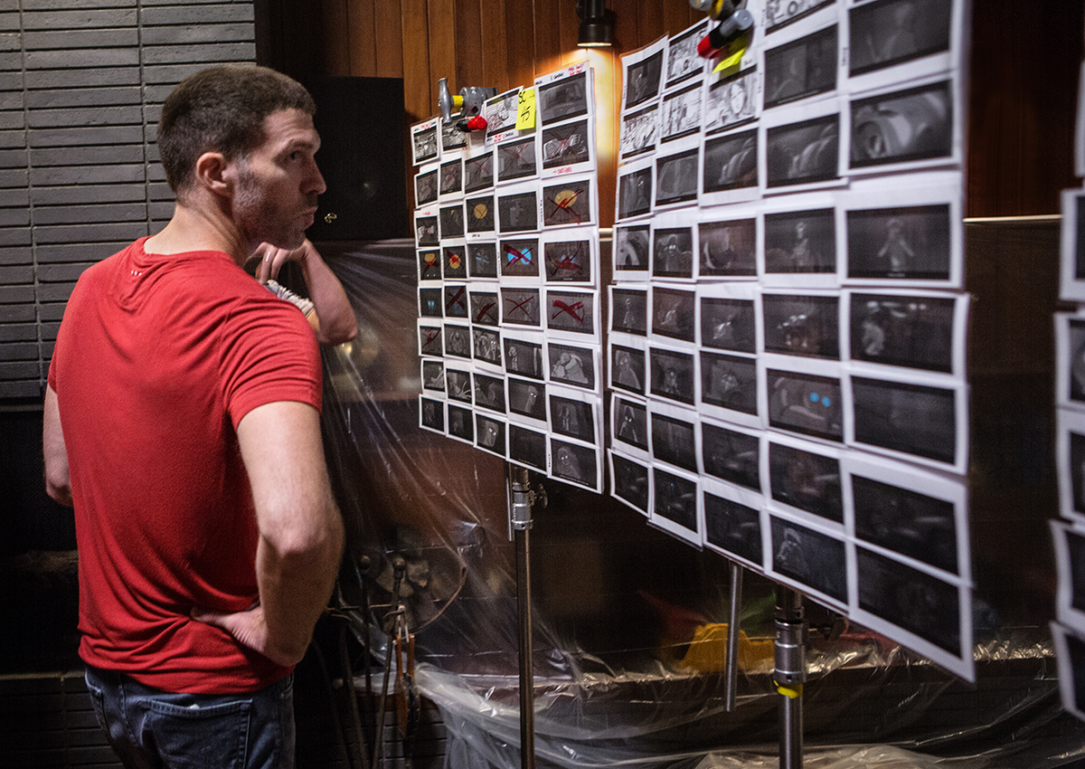Director Travis Knight examining a storyboarded sequence on set / Photo by Jaimie Trueblood, SMPSP