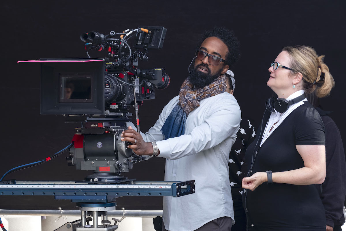 Director of Photography Tommy Maddox-Upshaw and On The Block Creator Lauren Iungerich on the set for Season 2 of this Netflix series, set in South L.A. / Photo by Nicola Goode, SMPSP